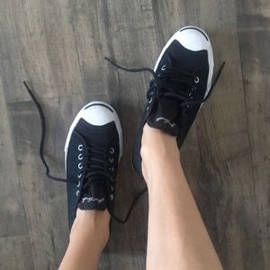 Jack Purcell sneakers.